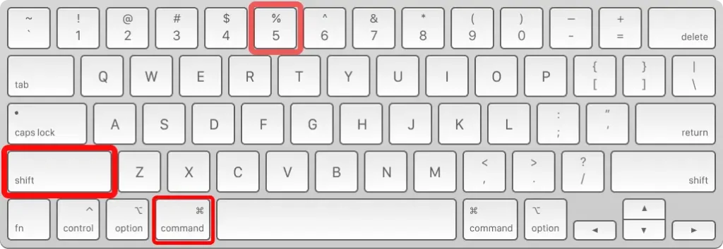 A close-up image of a standard QWERTY keyboard layout, likely for a Mac, highlighting three keys with red boxes: the **Shift** key on the left, the **Command** key on the bottom row next to the spacebar, and the **'%' / '5'** key on the top row.